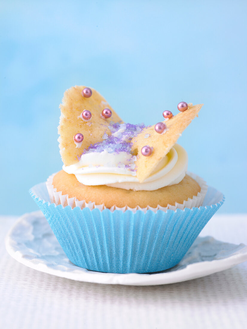 Close-up of butterfly muffin on plate