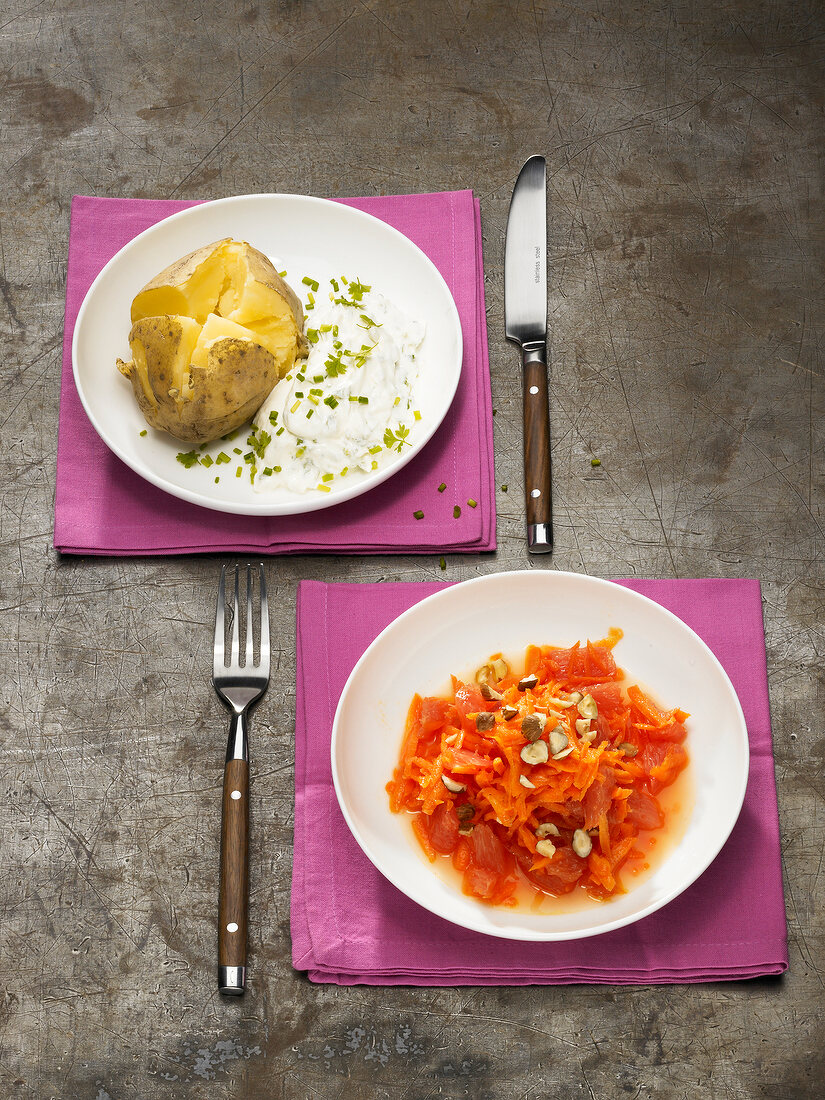 Raw vegetable salad and boiled potatoes with herb quark on plate