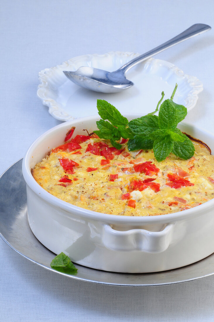 Couscous with yogurt and sheep cheese in casserole