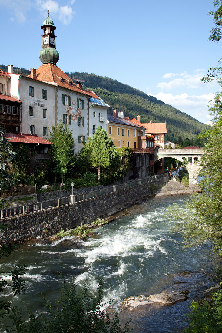 View of river Mur and buildings in Murau, Styria, Austria