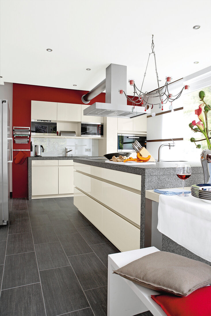 View of kitchen with white cabinets and granite countertop