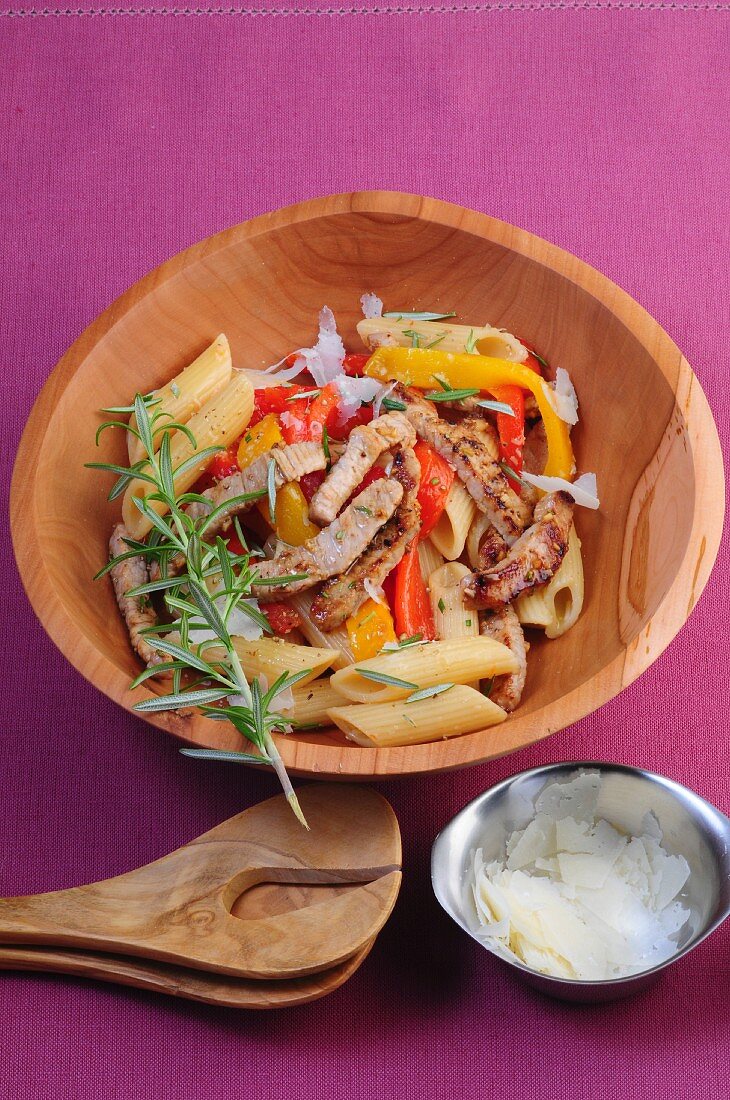 Pasta salad with veal, peppers and rosemary
