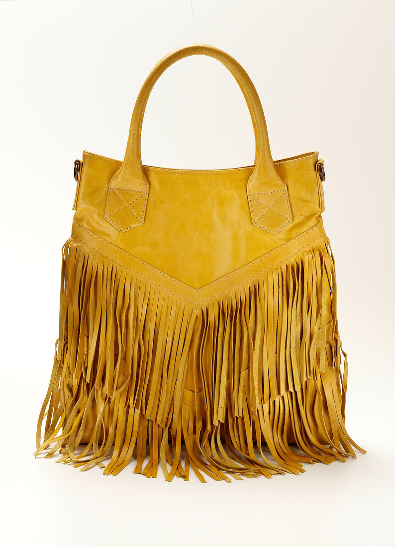 Hippie style yellow bag on white background