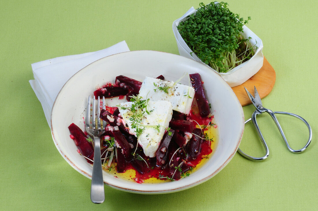 Beetroot salad with horseradish terrine on plate