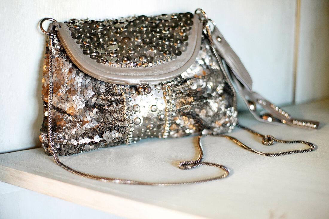 Close-up of hand bag with sequins
