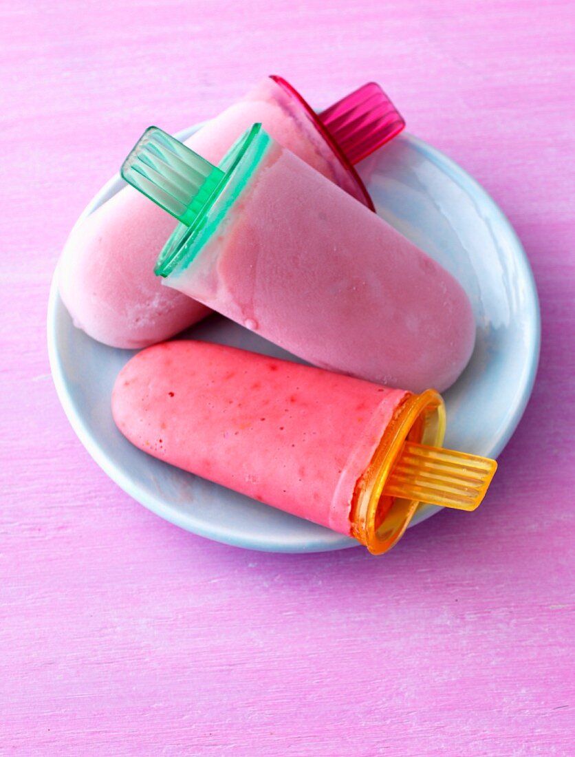 Homemade berry flavoured ice lollies