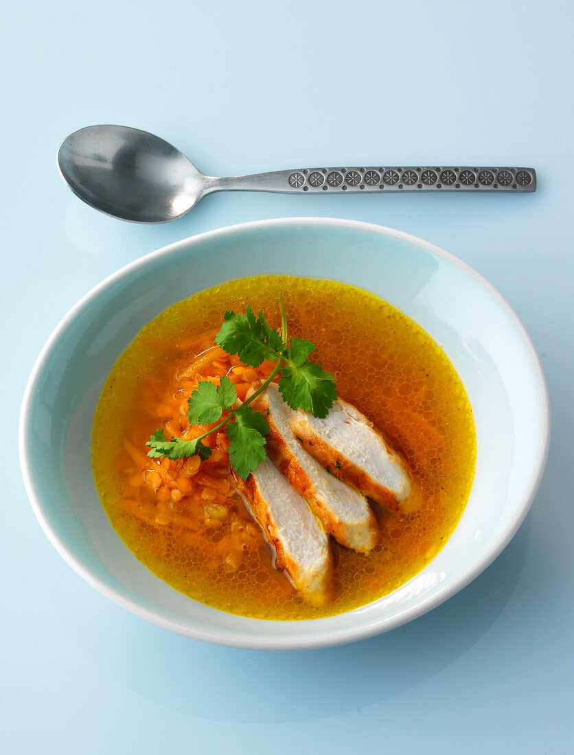 Bowl of chicken and lentil soup