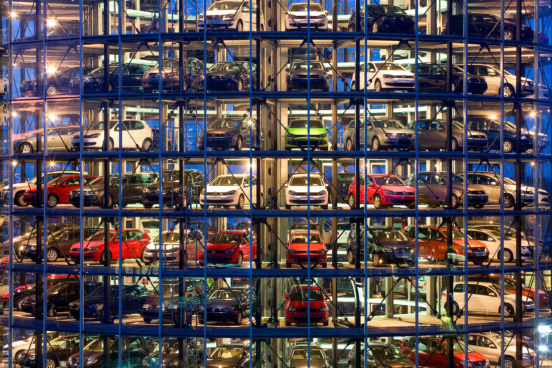 View of new cars in the glass towers of Autostadt, Wolfsburg, Germany
