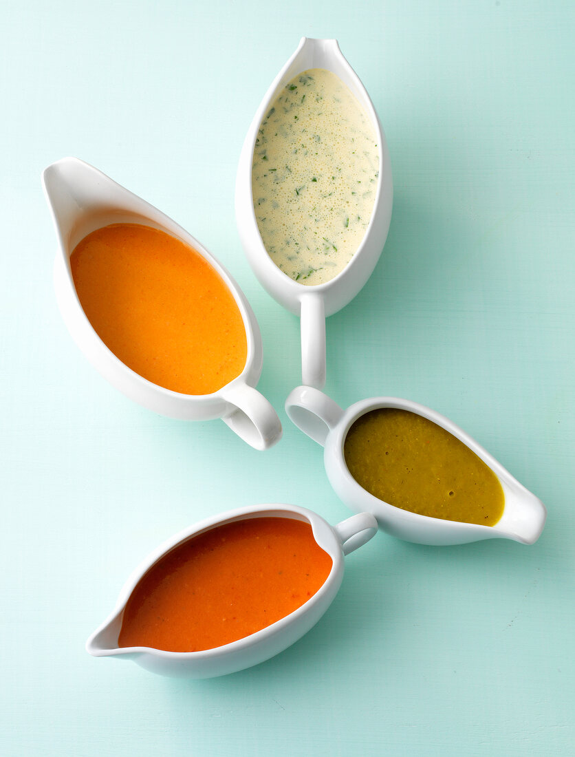 Four different sauces in sauce boat