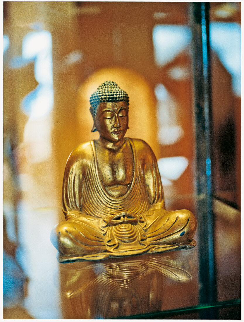 Close-up of golden Buddha statue