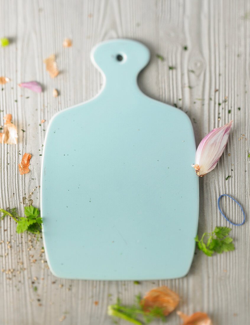 Close-up of chopping board kept on wooden table