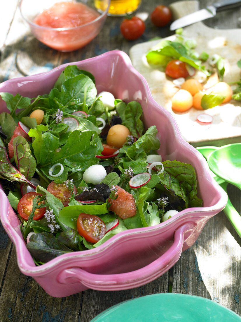 Salad with vegetables on serving dish