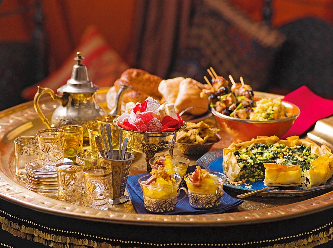 An Oriental buffet featuring main courses, bread and deserts