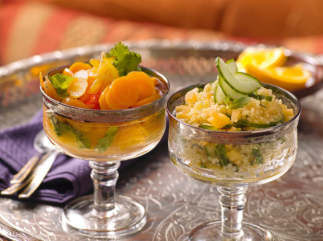 Two glasses with carrot and tabbouleh salad