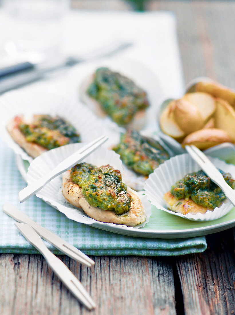 Mini-steak with wild garlic crust on plate