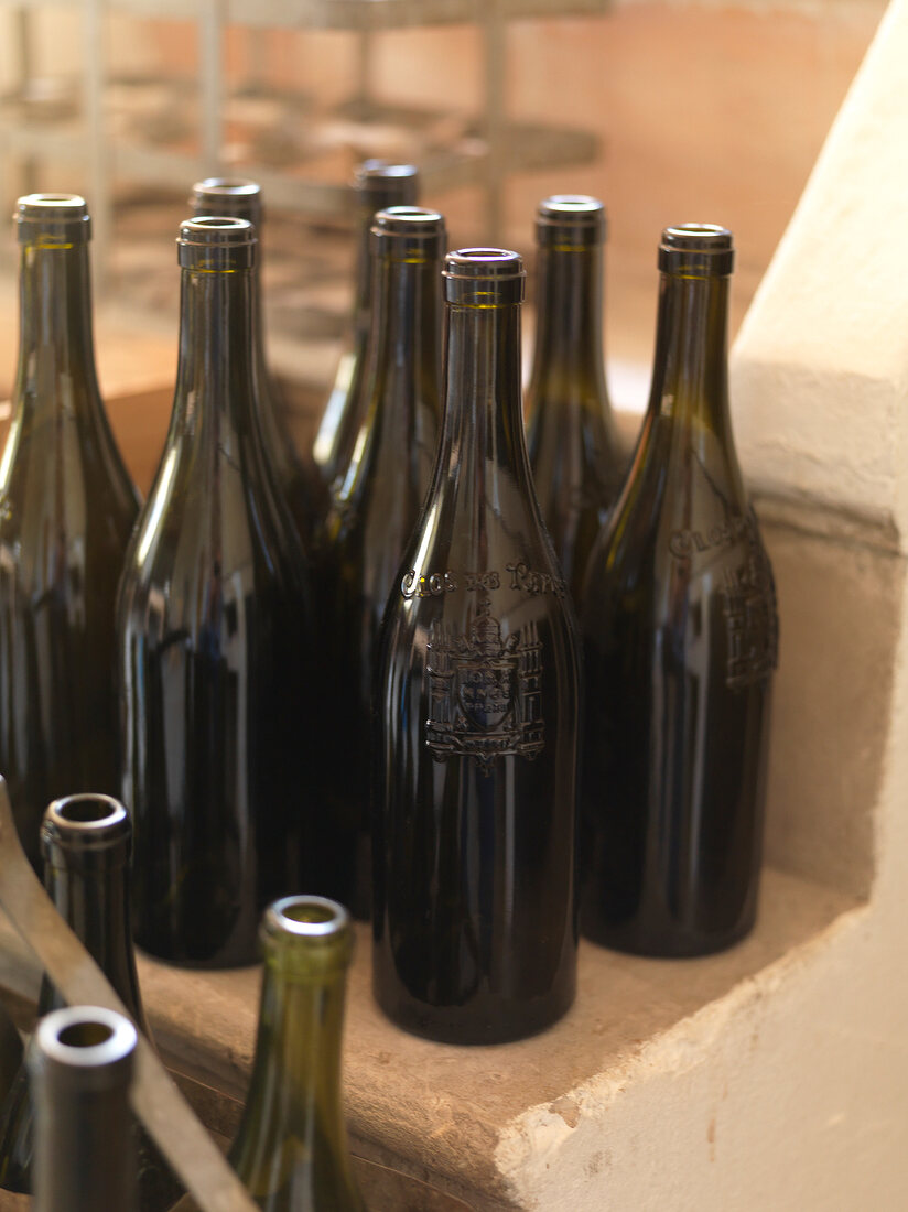 Close-up of wine bottles without label