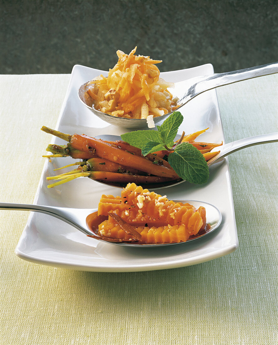 Variety of carrot salad in serving dish