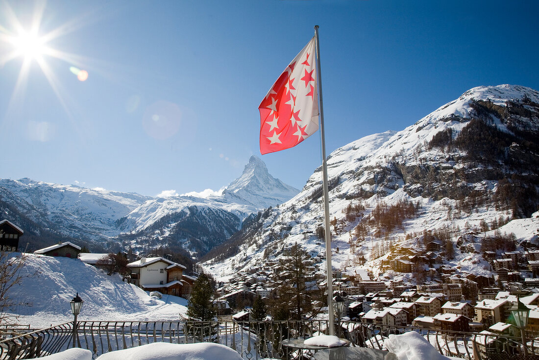 View of Matterhorn mountain and Valais flag in Switzerland