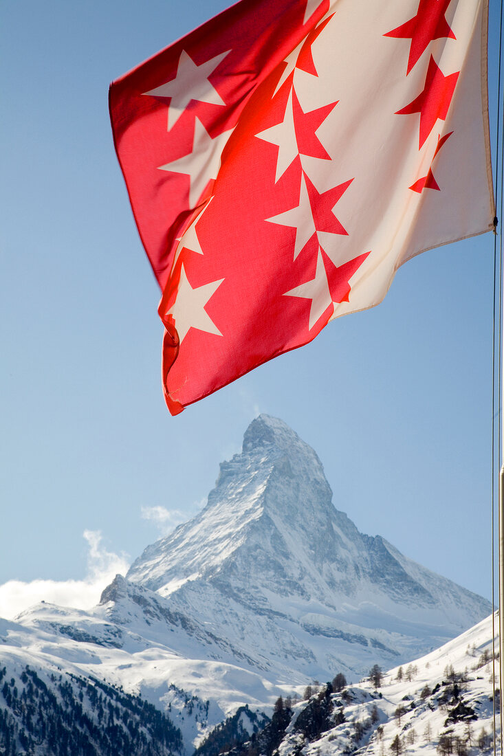 View of Matterhorn mountain and Valais flag in Switzerland