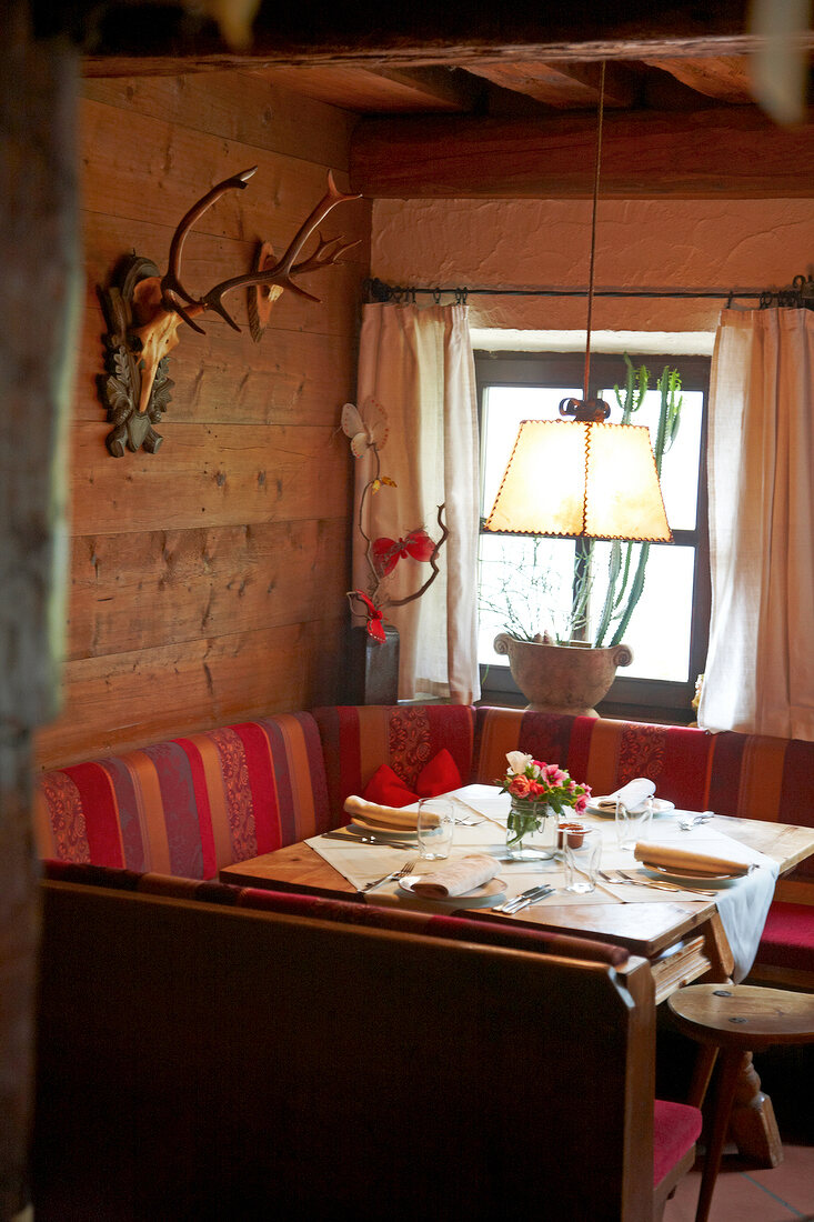 Corner table in Hotel Pretzhof with antlers on the wall