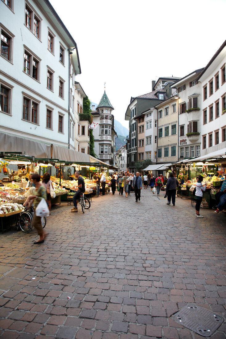 People at market in old town of Bolzano, Italy