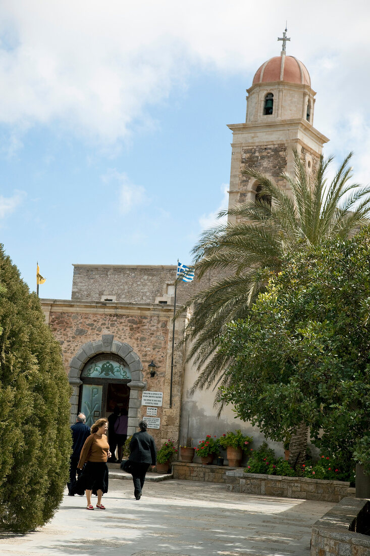 Tourist at Moni Toplou monastery in Crete, Greece