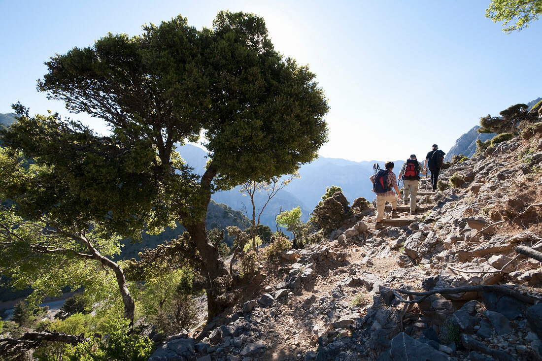 Tourists hiking on white mountains in Crete ,Greek
