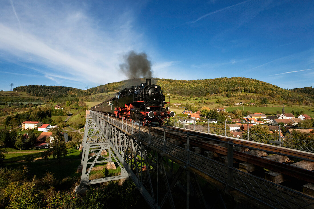View of Wutach Valley and train passing on railway in Black Forest, Germany
