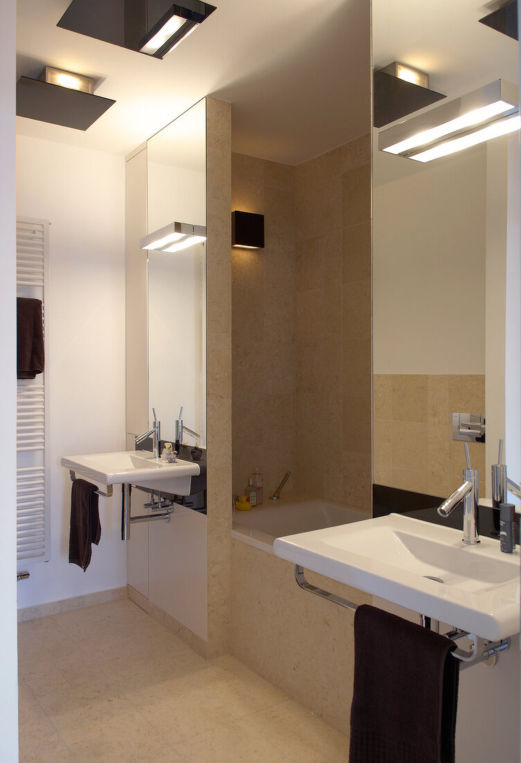 Modern bathroom with two sinks and tub