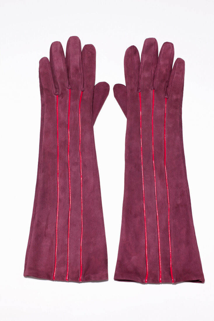 Suede gloves on white background