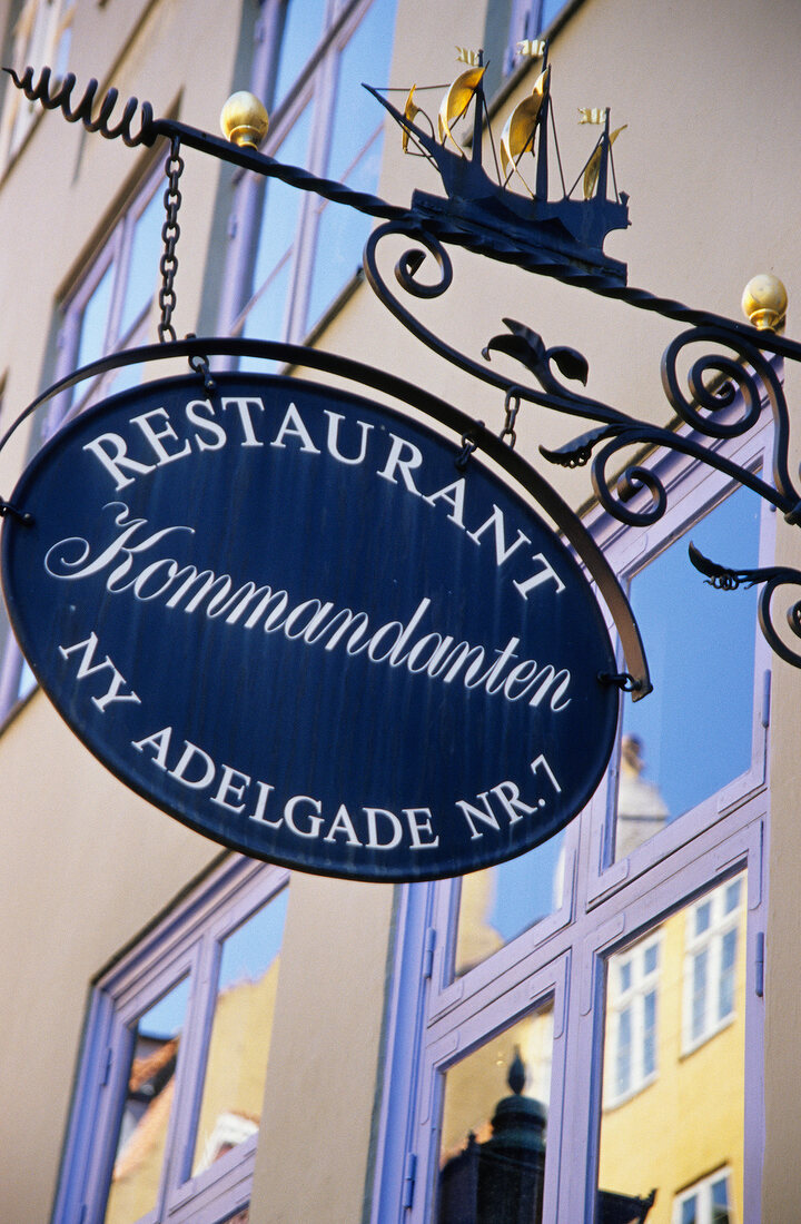 Signboard of Restaurant commanders in Ny Adelgade 7 in Copenhagen, Denmark