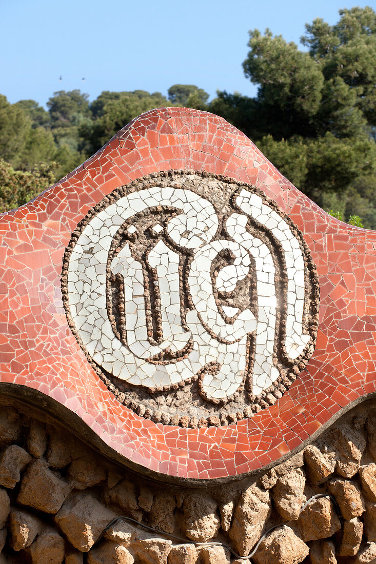 Mosaic lettering in Park Guell, Barcelona, Spain