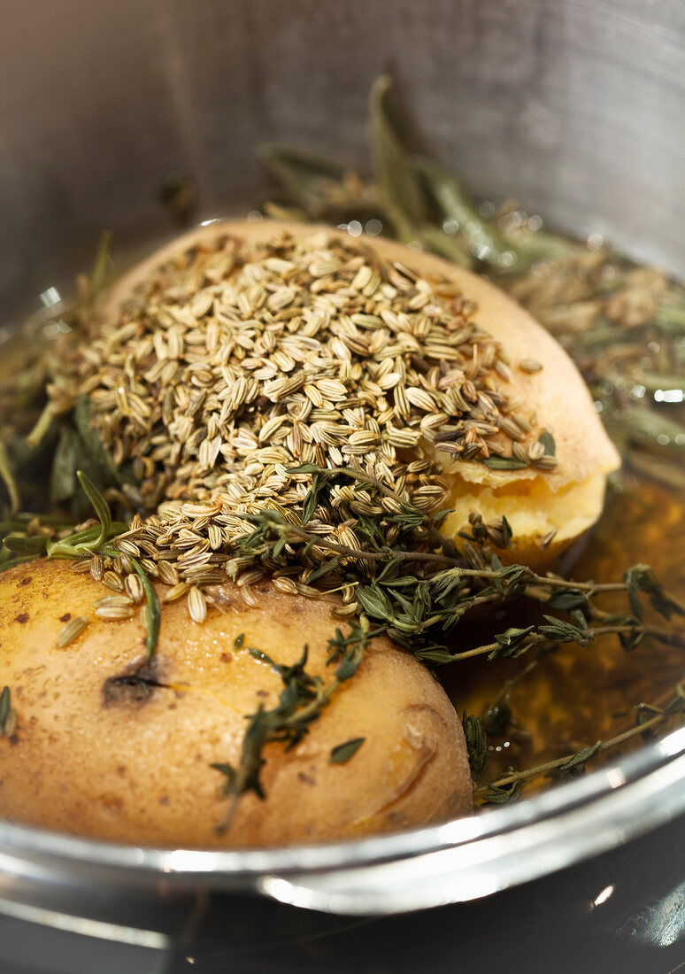 Close-up of baked potatoes with fennel seeds