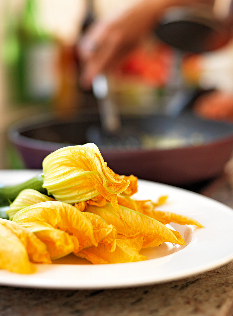 Close-up of zucchini flower on plate