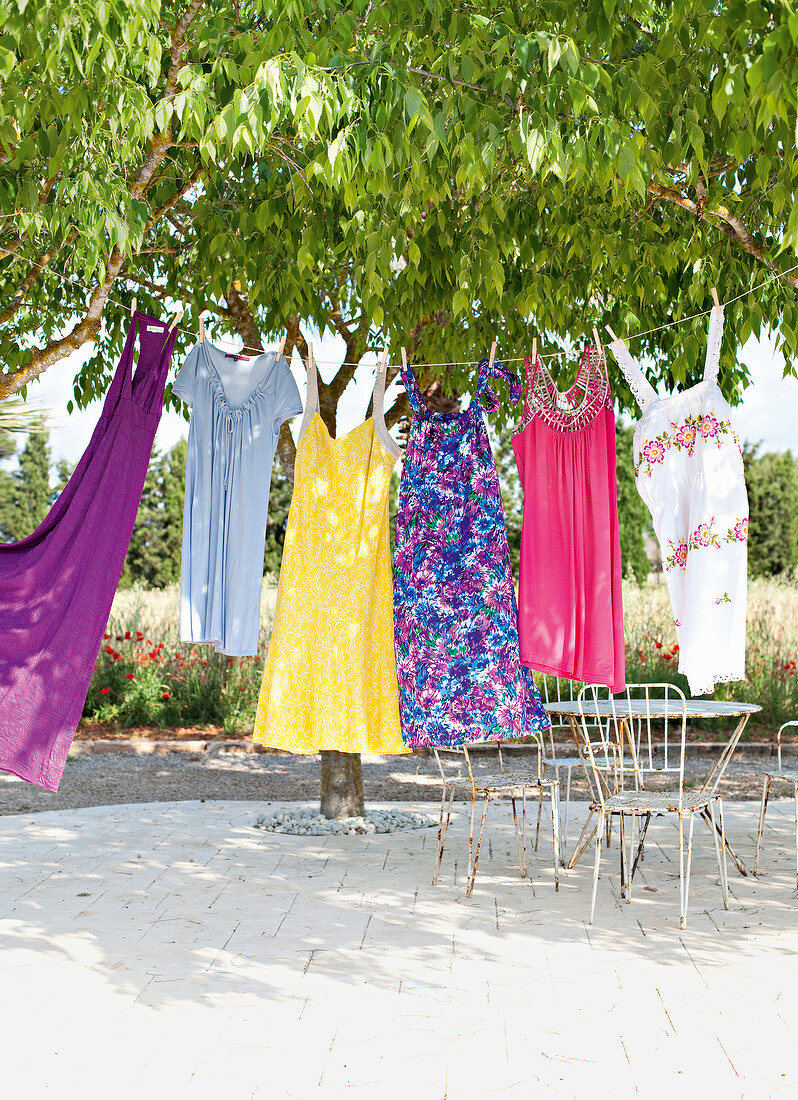 Summer dresses made of organic materials on a rope