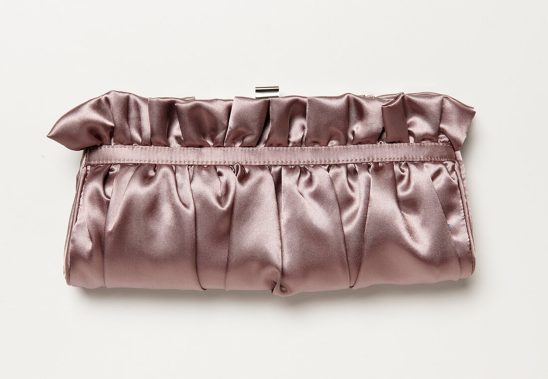 Satin Clutch with ruffles on white background