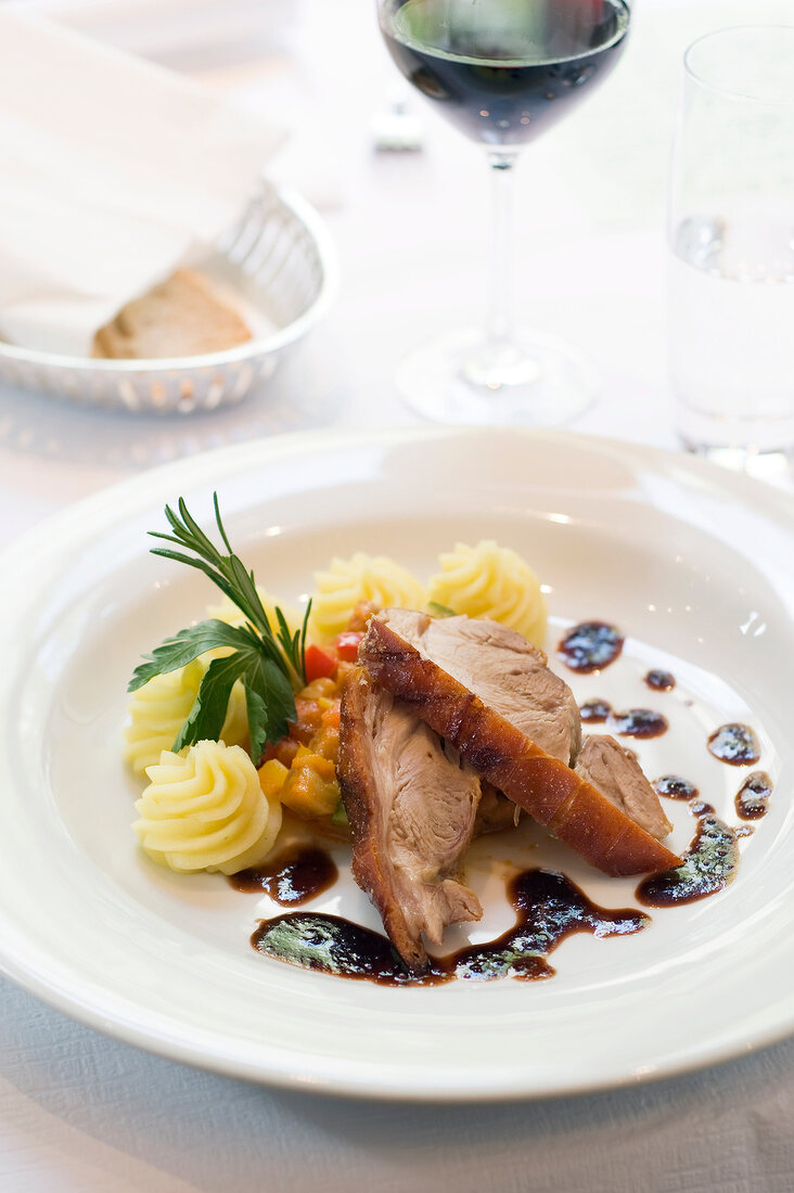 Close-up of roasted pork on dish