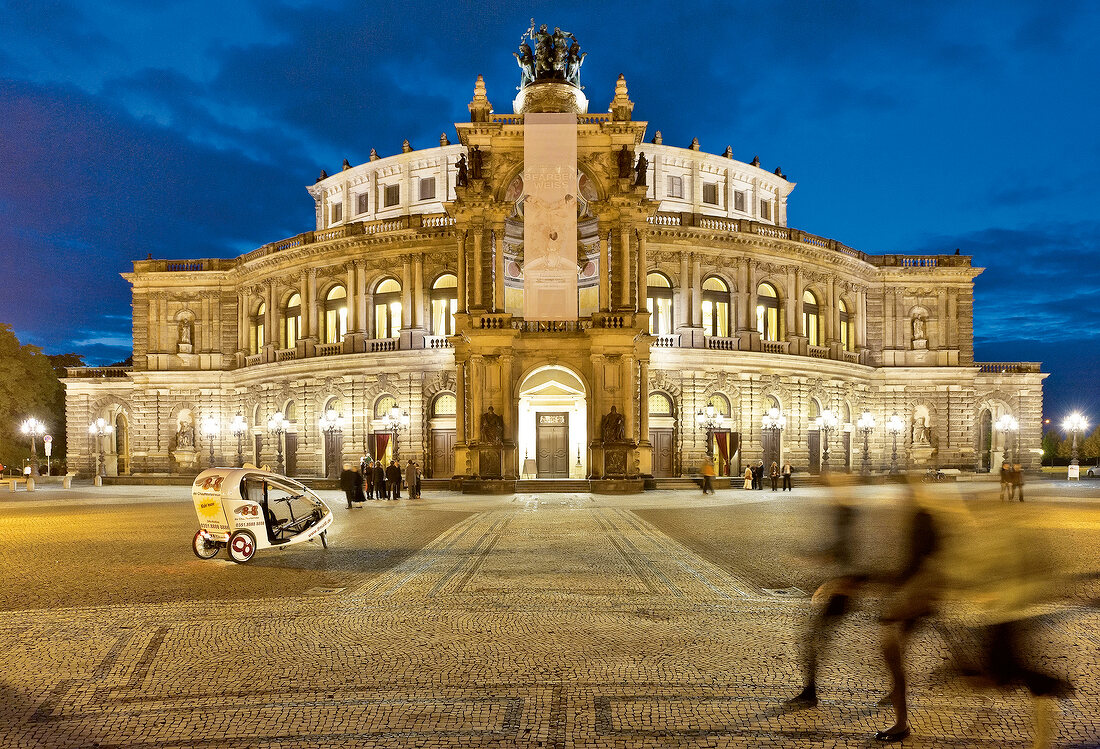 Facade of Dresden Semper Opera House at night, Saxony, Germany, blurred motion