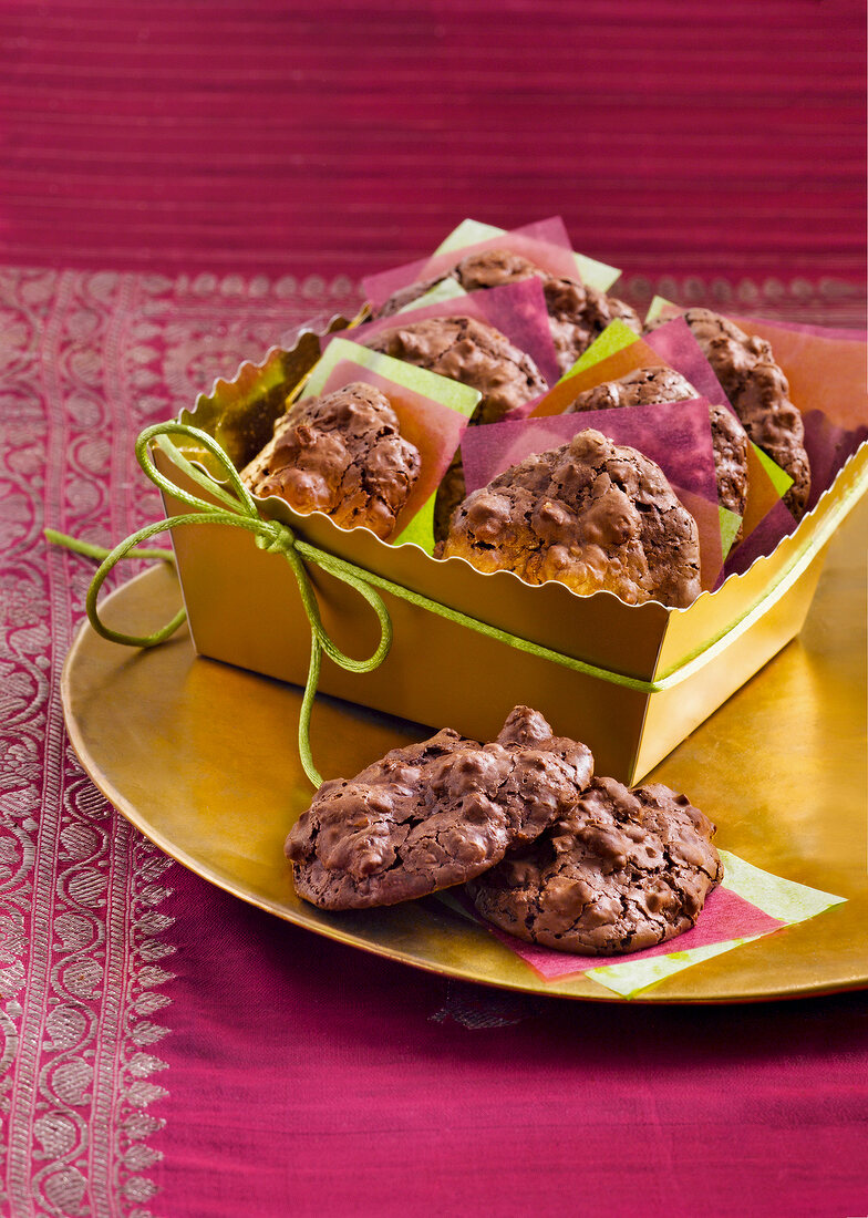 Close-up of walnut chocolate cookies in box