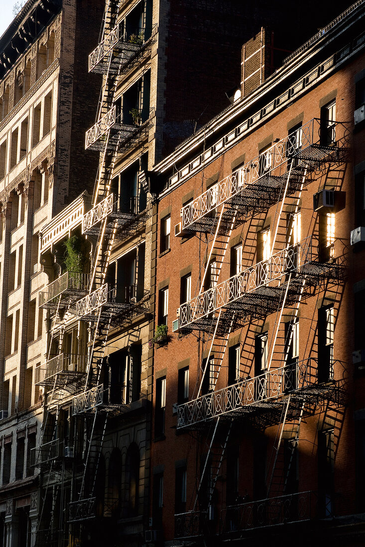 View of building with fire escape at evening, SoHo, New York, USA