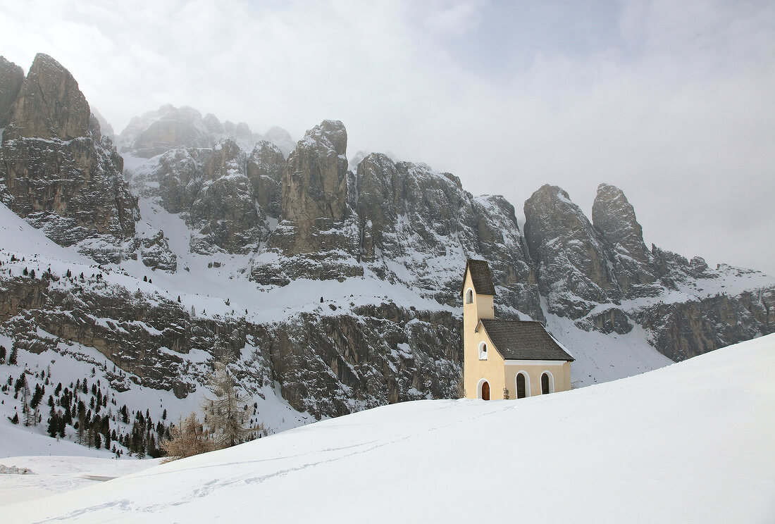 View of Chapel at the Gardena pass in front of the Sella Group, South Tyrol, Italy