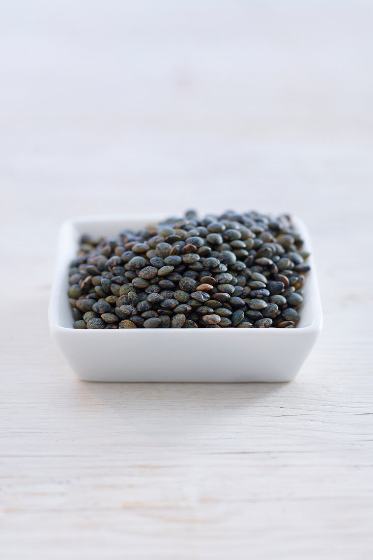 Green lentils in bowl
