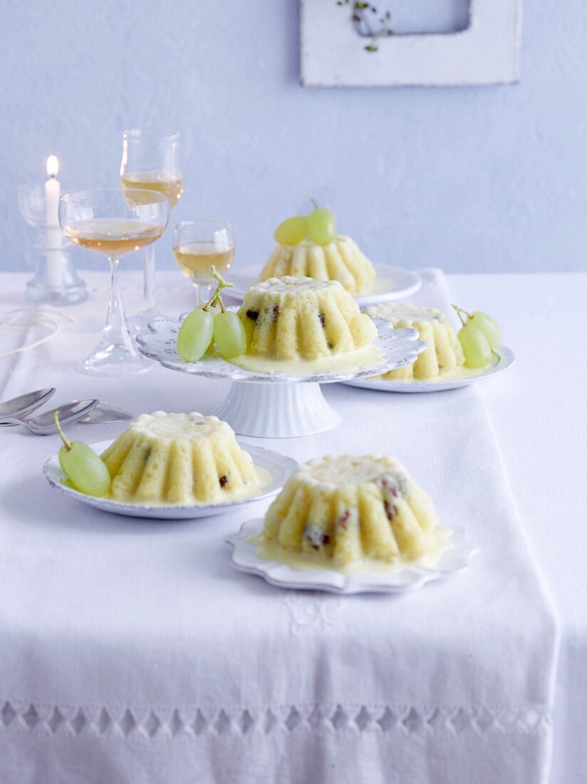 Pudding with apples, grapes and vanilla sauce