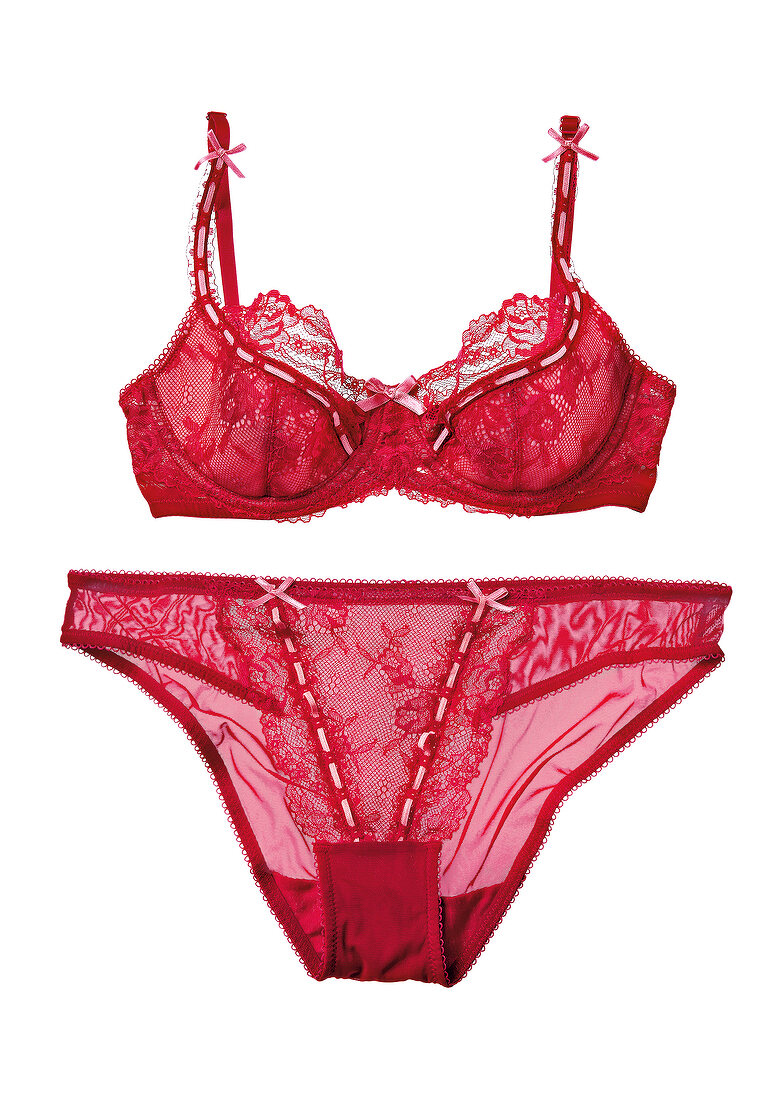 Red push-up bra and bikini panty with floral lace on white background