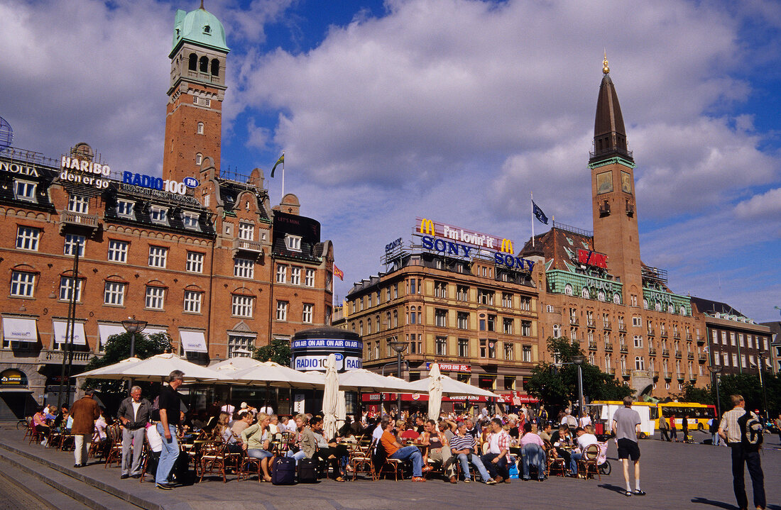 People sitting outside Terrace cafes on Town Hall Square, Town Hall, Copenhagen, Denmark