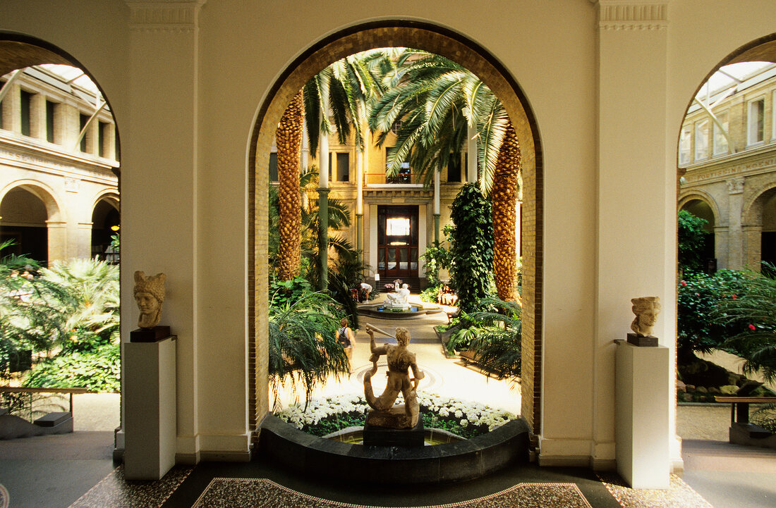 Winter Garden with sculpture in Glyptotek Museum, Copenhagen, Denmark