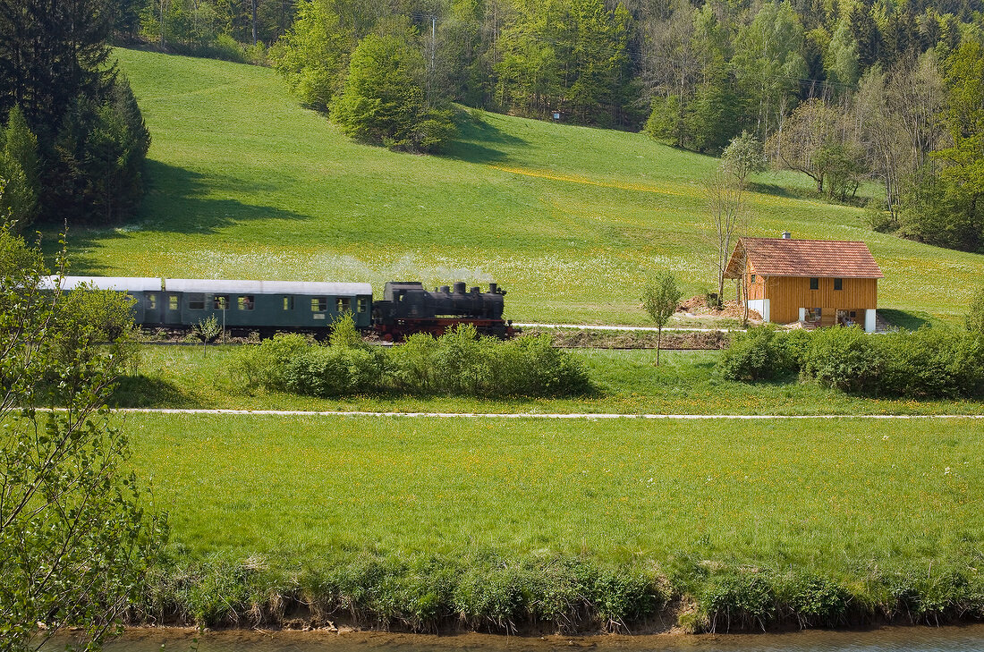 View of train and rock mountain in Franconian Switzerland, Bavaria, Germany