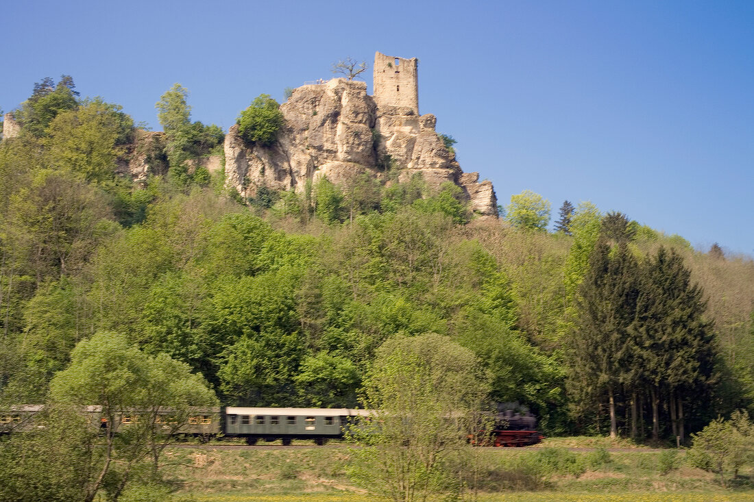 View of train and rock mountain in Franconian Switzerland, Bavaria, Germany