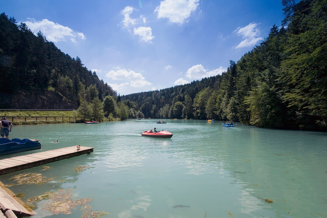 People boating in lake in Franconian Switzerland, Bavaria, Germany