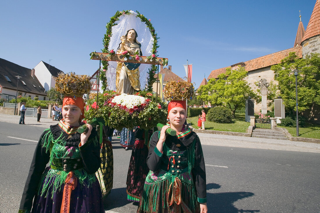 Procession on road in Franconian Switzerland, Bavaria, Germany